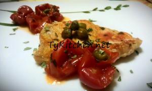 Lonza di maiale con capperi e pomodori